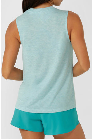 A person is shown from the back wearing the Lorna Jane Lotus Muscle Tank in light blue and teal shorts against a plain, light-colored background.