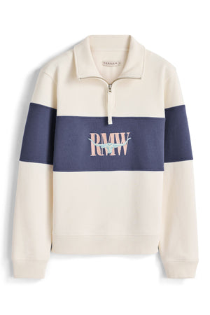 Introducing the RM Williams Trickett Panel Sweatshirt—a cream pullover crafted from premium Australian cotton, featuring a distinctive navy horizontal stripe across the chest and sleeves, a classic quarter-zip collar, and “PMW” heritage embroidery in multicolored thread on the front.