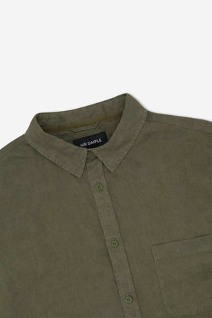 A close-up of the Mr Simple Linen Short Sleeve Shirt in olive green, featuring a collar, front pocket, and visible "MR SIMPLE" labelβan ideal addition to any summer wardrobe.