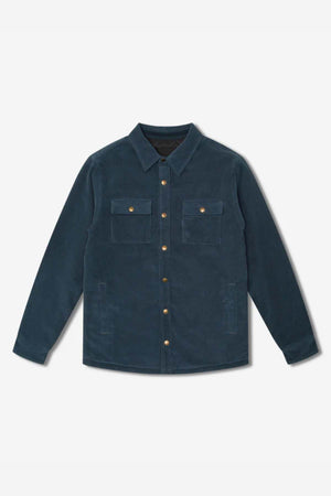 The Mr Simple Quilted Cord Jacket in dark teal showcases a relaxed fit with a collar, long sleeves, and two front chest pockets with button flaps. Made from cotton corduroy and featuring gold buttons, it is presented laid out flat on a plain white background.