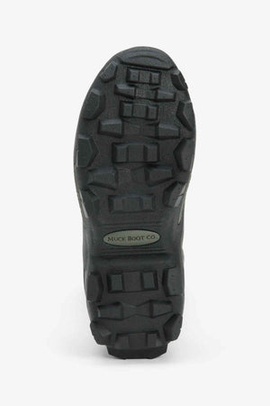 Close-up of the sole of a Muck Boot Muckmaster Mid Boot, showcasing an aggressive tread pattern and deep lugs for traction. A small label near the center reads "Muck Boot Co." The boot, featuring an MS-1 molded outsole and neoprene construction, appears designed for rugged outdoor use. The background is white.