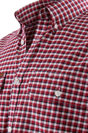 Close-up of the Mustang Signature Check Shirt with a red and white checkered button-up design. Featuring white buttons, two chest pockets, and a collar, this high-quality cotton shirt boasts a plaid pattern with blue and black lines running through the red and white checks.