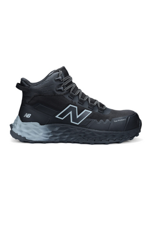 The New Balance Cremorne Mid Safety Shoe is a black athletic shoe with a mid-top design, thick gray slip-resistant sole, and white logo on the side, shown in profile against a white background.