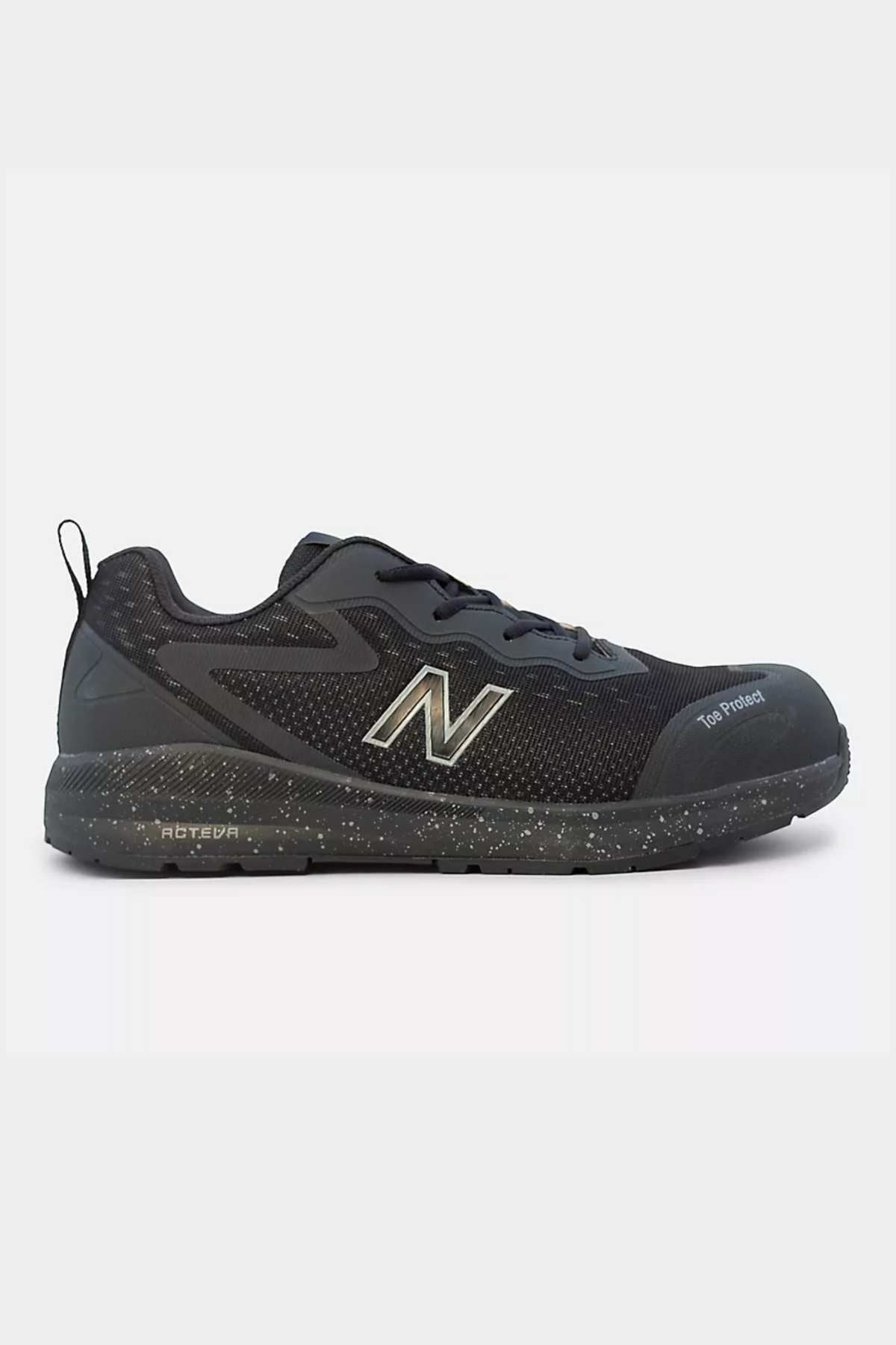 The New Balance Logic Safety Work Shoe is a black athletic safety shoe featuring slip-resistant properties, a reinforced toe, and a speckled rubber sole. The shoe boasts a prominent grey "N" logo on the side, along with a breathable mesh upper and a pull tab at the heel for enhanced comfort and support during physical activities.