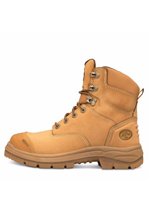 The Oliver AT Lace Up Zip Side Boot 55332Z is a tan leather work boot with a brown slip-resistant rubber sole, steel toe, metal eyelets, padded ankle collar, branded side patch, visible stitching, and reinforced toe on a plain white background.