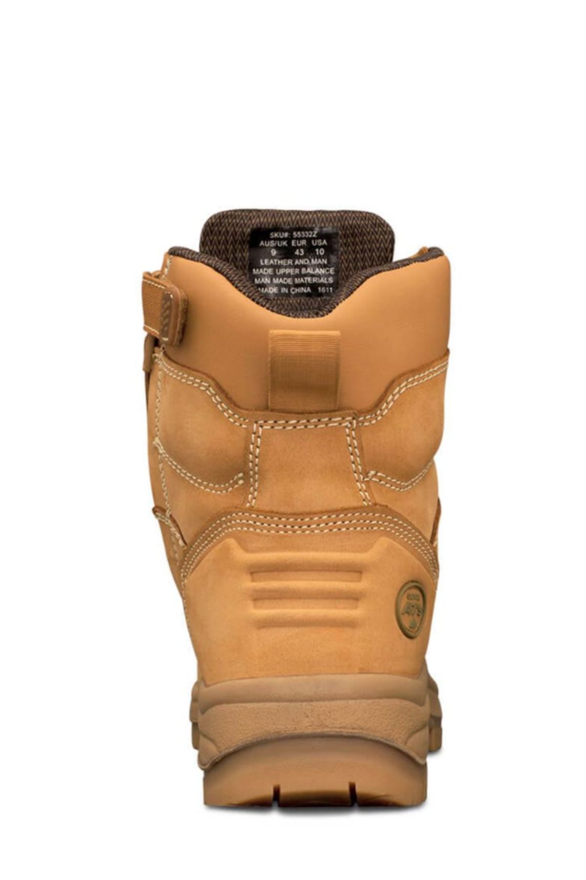 The Oliver AT Lace Up Zip Side Boot 55332Z is a tan, slip-resistant work boot shown from the back, with detailed stitching, padded ankle support, and an inside collar label displaying size and care info.