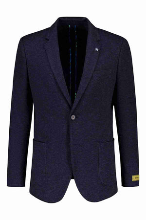 The Uberstone Zeller Jacket is a dark navy blazer with a notched lapel, two buttons, and a small flower detail on the left lapel. Made from a sleek wool blend, it has two front pockets, a small yellow tag on the right sleeve's bottom edge, and slightly visible interior lining for a tailored look.