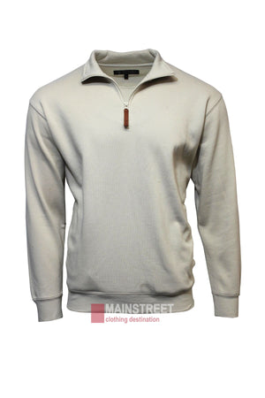 The Pilbara Classic Fleece Pullover features a light beige, long-sleeve design with cozy fleece lining and a leather zipper pull. Displayed on a white background with the Mainstreet Clothing Destination logo at the bottom.