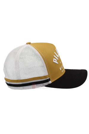Side view of the Pilbara Western Classic Cap featuring a mustard yellow front, black curved brim, breathable mesh back, black-and-white striped detail above the brim, and a partially visible white embroidered logo on the front.