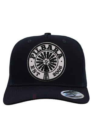 The Pilbara Western Established Cap is a black mesh cap with a flat brim, circular patch featuring a windmill and "PILBARA EST 2006" on the front, plus a visible sticker.