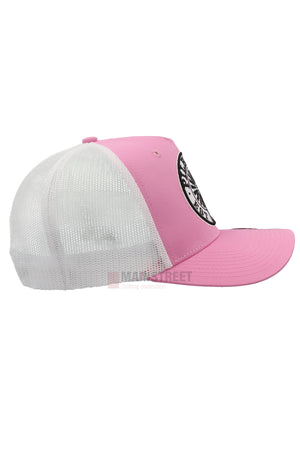 The Pilbara Western Established Cap features a pink and white breathable mesh design, a black and white circular front patch, a curved bill, and a white mesh back—ideal for outdoor adventures.