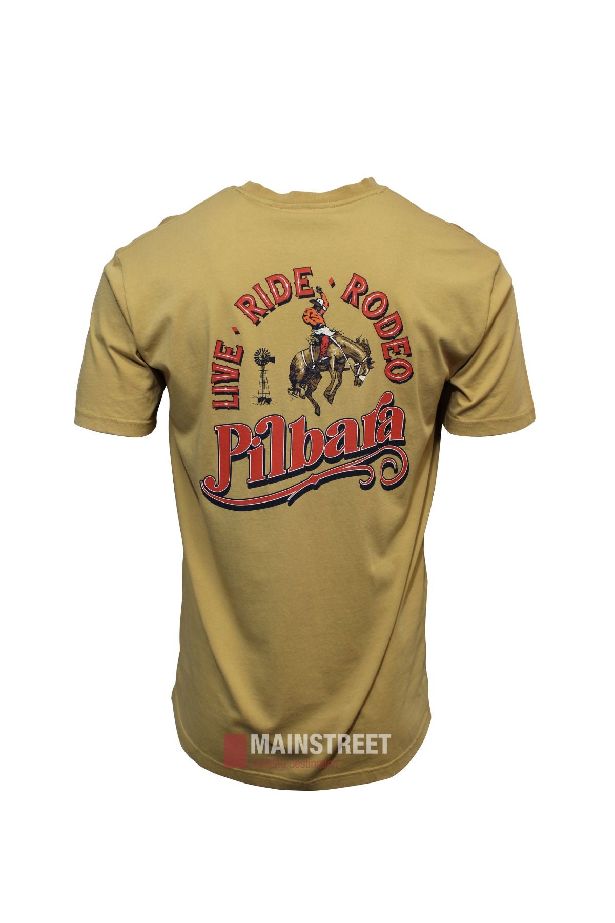 The Pilbara Western Rodeo T-Shirt is tan, 100% cotton, with a classic fit. The back shows a rodeo rider, red “WE RIDE RODEO” above, “Pilbara” below, small trees, and "MAINSTREET" at the bottom.