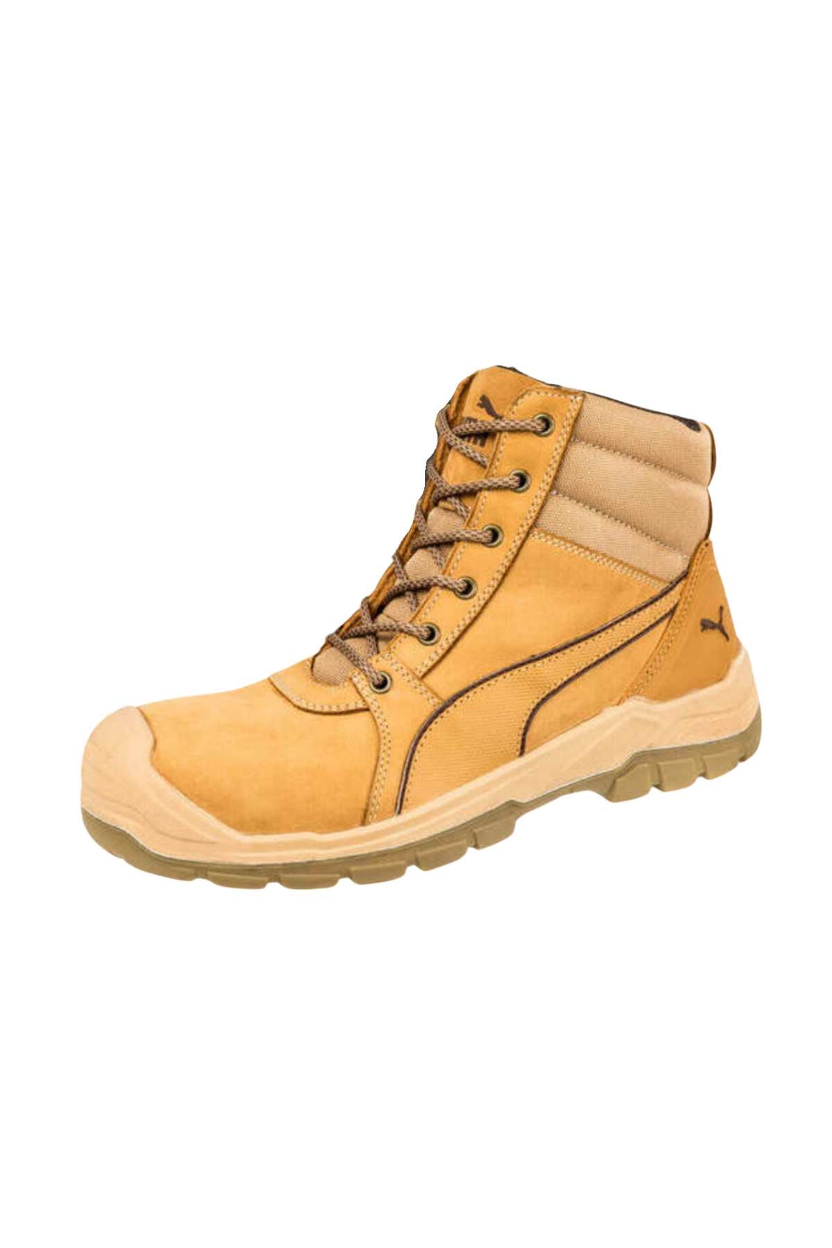 The Puma Tornado Safety Boot, shown on a white background, is crafted from tan and beige nubuck leather and features a padded ankle collar, thick rubber sole, BreathActive lining, and the Puma logo near the heel.