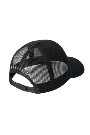 The RM Williams Genuine Longhorn Trucker Cap features black mesh, an adjustable snapback, and "AUSTRALIA" in white on the left above the opening—adding a modern touch to this classic cap style.