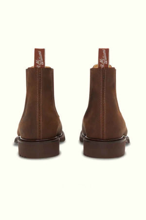 The RM Williams Gardener Boot is a unisex brown leather Chelsea boot, shown from the back with red pull tabs featuring white text and prominent heel stitching.