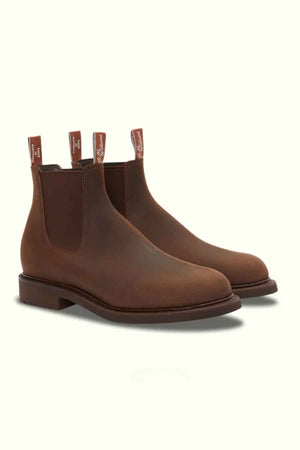 The RM Williams Gardener Boot is a unisex brown water-resistant leather Chelsea boot with elastic side panels, front and back pull tabs, a low heel, shown against a light background.