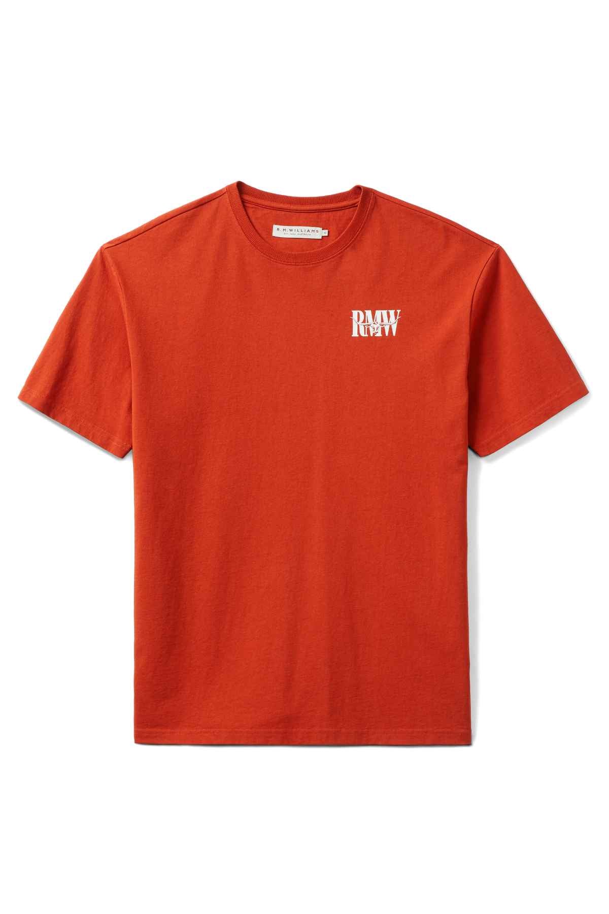 The RM Williams Classic Tee in red is made from organic cotton, featuring a classic crew neck and a vintage vibe with its small white logo in block letters on the upper left chest, blending simplicity with timeless style.
