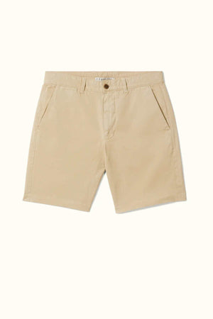 The RM Williams Berwick Chino Short, crafted from organic cotton in khaki beige, features side pockets, a front button, and belt loops. These modern tailored shorts are designed with comfort stretch to ensure a perfect fit and are set against a plain white background.