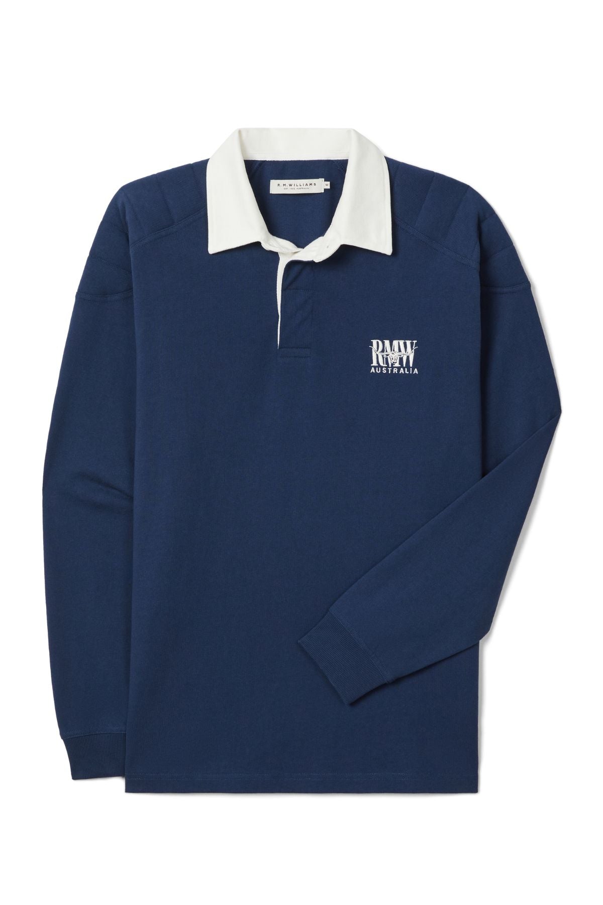 The RM Williams Classic R.M.W Rugby is a navy blue, long-sleeve Australian cotton shirt with a white collar, partial button placket, and “RAW AUSTRALIA” text plus logo embroidered in white on the left chest.
