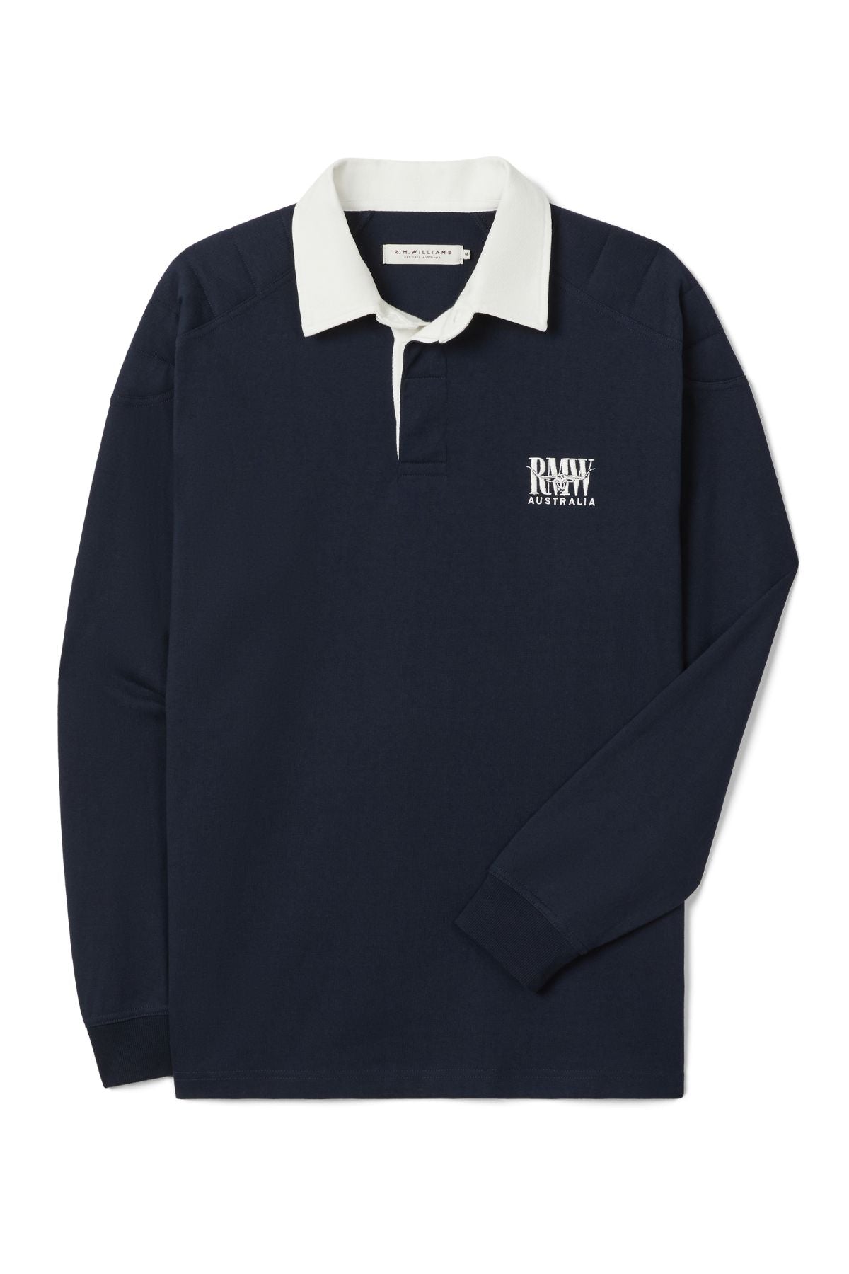 The RM Williams Classic R.M.W Rugby shirt features heavyweight Australian cotton in navy blue, a contrasting white collar, and a white "RAW AUSTRALIA" logo on the left chest. It’s shown laid flat with the right sleeve crossed over.