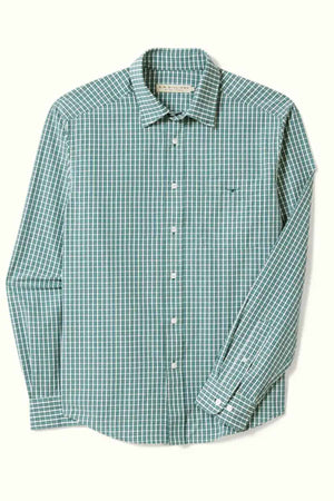 The RM Williams Classic Shirt is a green, long-sleeve button-up featuring a white gingham check pattern. Made from cotton poplin, this classic fit shirt includes a pointed collar, a single chest pocket, and white buttons along the front and cuffs.
