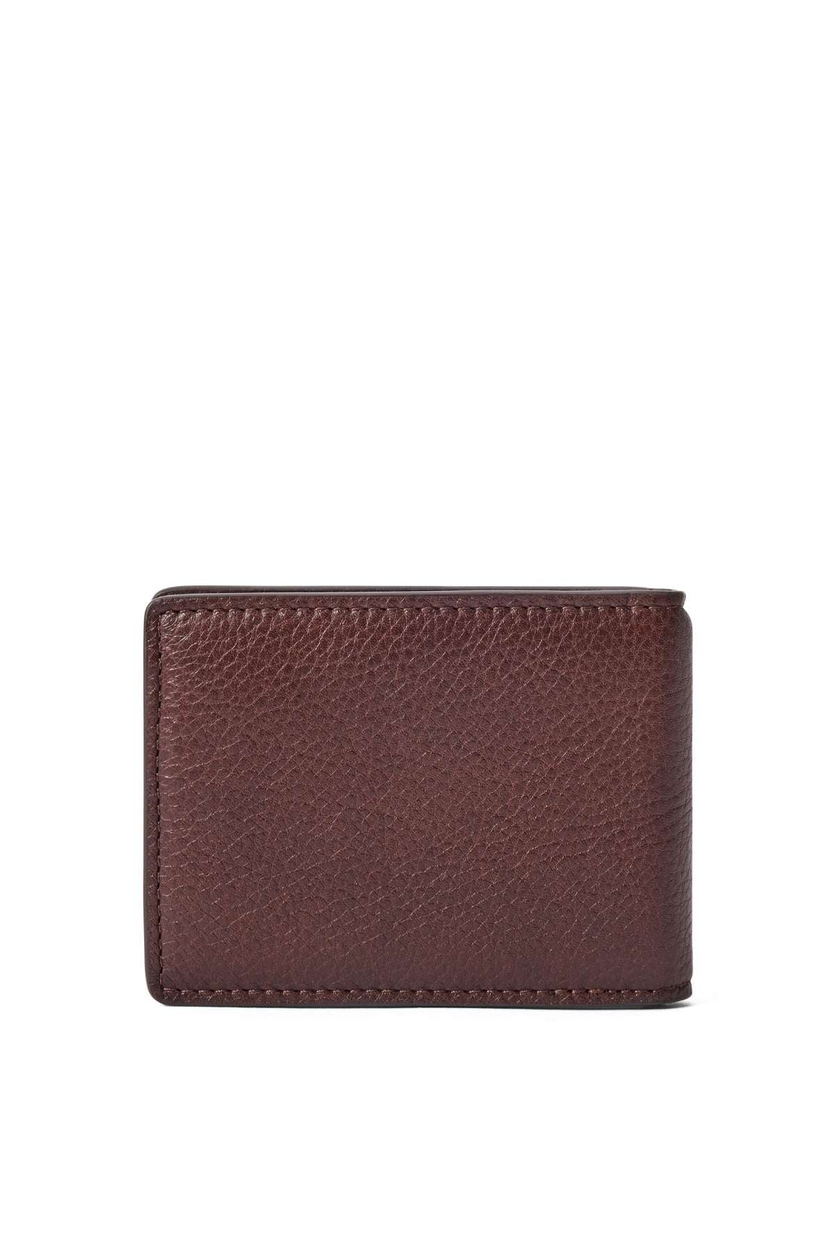 The RM Williams Farrier Bi Fold Clip Wallet is a closed, rectangular brown leather wallet with a slightly textured surface, displayed against a white background.