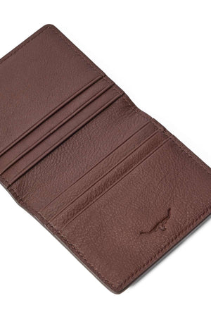 The RM Williams Farrier Fold Cardholder in brown leather opens to reveal multiple card slots on both sides and a subtle embossed bull logo at the bottom right.