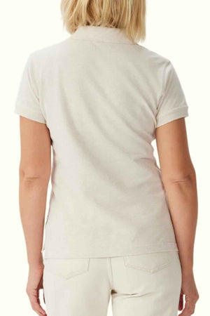 RM Williams Margaret Polo in the colour Oatmeal. Back view of model wearing polo shirt.
