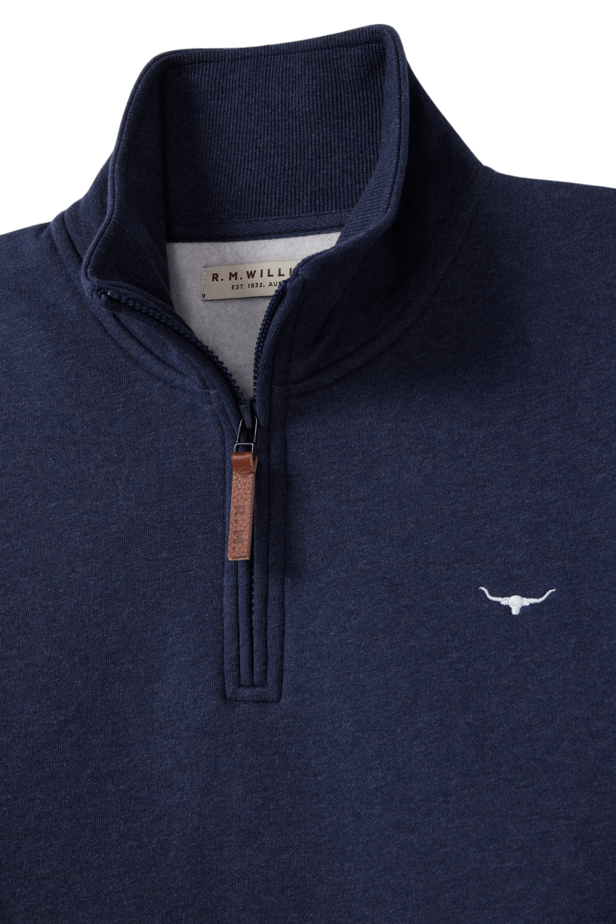 The RM Williams Mulyungarie Fleece is a navy blue quarter-zip sweatshirt crafted from brushed cotton fleece, featuring a brown leather zipper pull and an embroidered bull's head logo on the left chest. The inner tag displays "R.M. Williams.