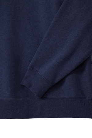 Close-up of the RM Williams Mulyungarie Fleece navy blue quarter-zip sweatshirt, highlighting its right sleeve and a section of the body. The fabric looks soft and slightly textured, featuring ribbed cuffs and hem.