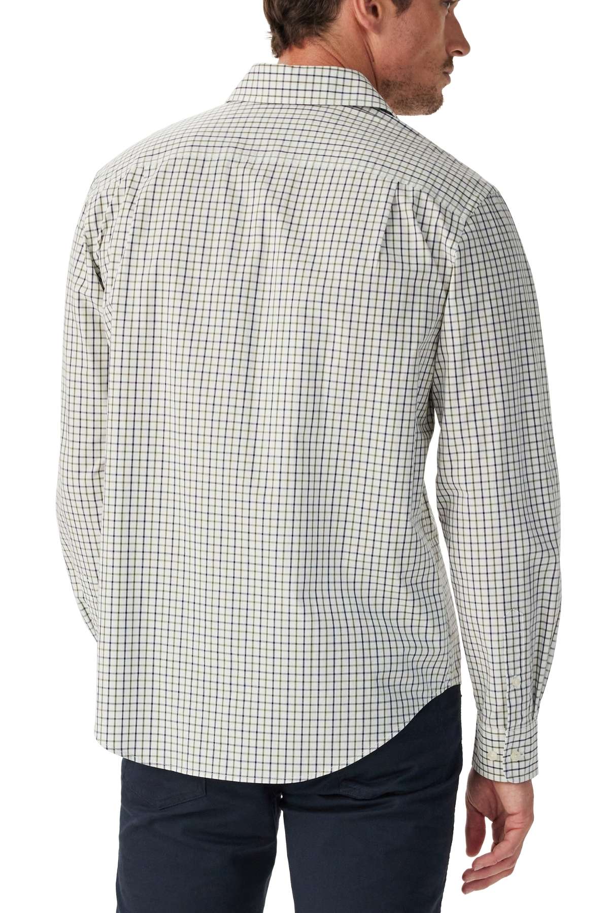 A man with short brown hair is seen from the back wearing the RM Williams Newland Poplin Check Shirt in a blue and green checkered pattern, paired with dark pants, standing against a plain white background.