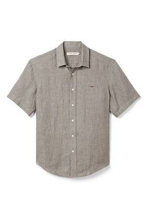 The RM Williams Newman Linen Short Sleeve Shirt features a relaxed fit, light gray French linen, short sleeves, a collar with white buttons, and a small embroidered logo on the left chest.