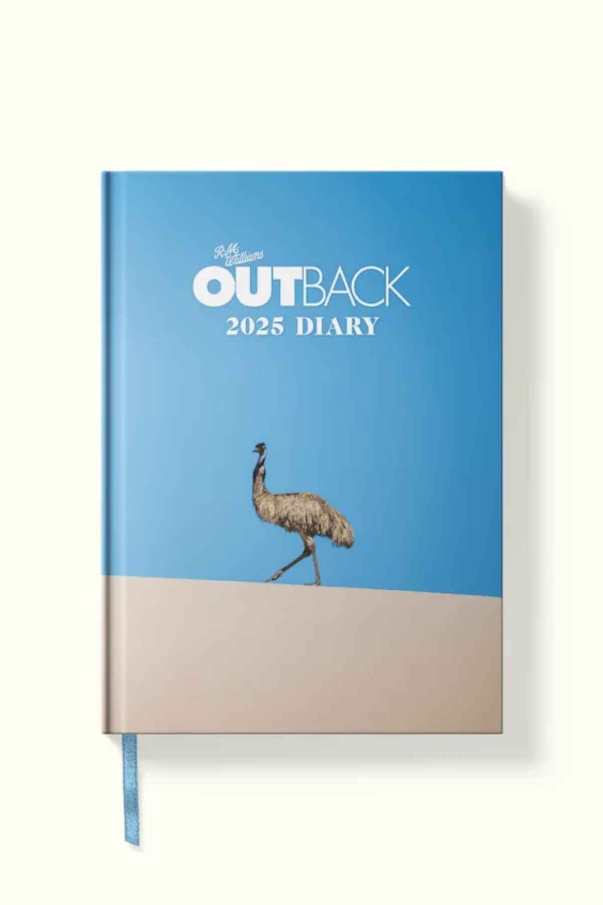 The RM Williams Outback Diary 2025 is a hardcover planner with a blue cover showing an emu on sand beneath a clear sky, with “R.M. Williams OUTBACK 2025 DIARY” in white and light blue lettering on the front.