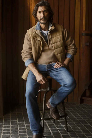 RM Williams Patterson Creek Vest in the colour Sandstone. Model wearing vest