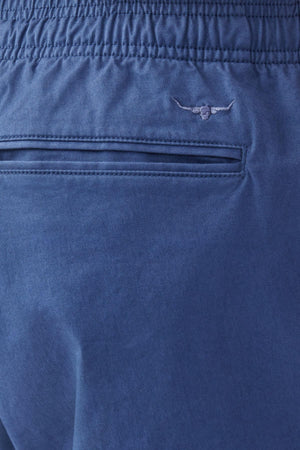 Close-up of the back pocket on RM Williams R.M.W Rugby Short, made from stretch cotton twill with an elastic waistband and an embroidered longhorn skull logo above the pocket, offering a relaxed style.