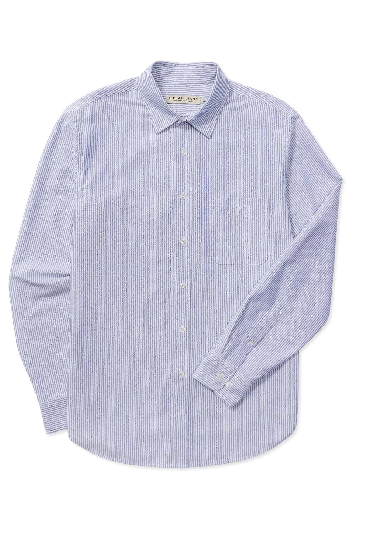 The RM Williams Regular Shirt is a blue and white striped long-sleeve button-up made from organic cotton, featuring a chest pocket, classic collar, and buttoned cuffs. This shirt merges timeless style with eco-friendly comfort.