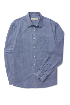 The RM Williams Classic Shirt is a long-sleeve, button-up shirt featuring a micro gingham check pattern in blue and white. This shirt includes a front chest pocket and a standard collar, crafted from lightweight fabric perfect for both casual and semi-formal occasions.