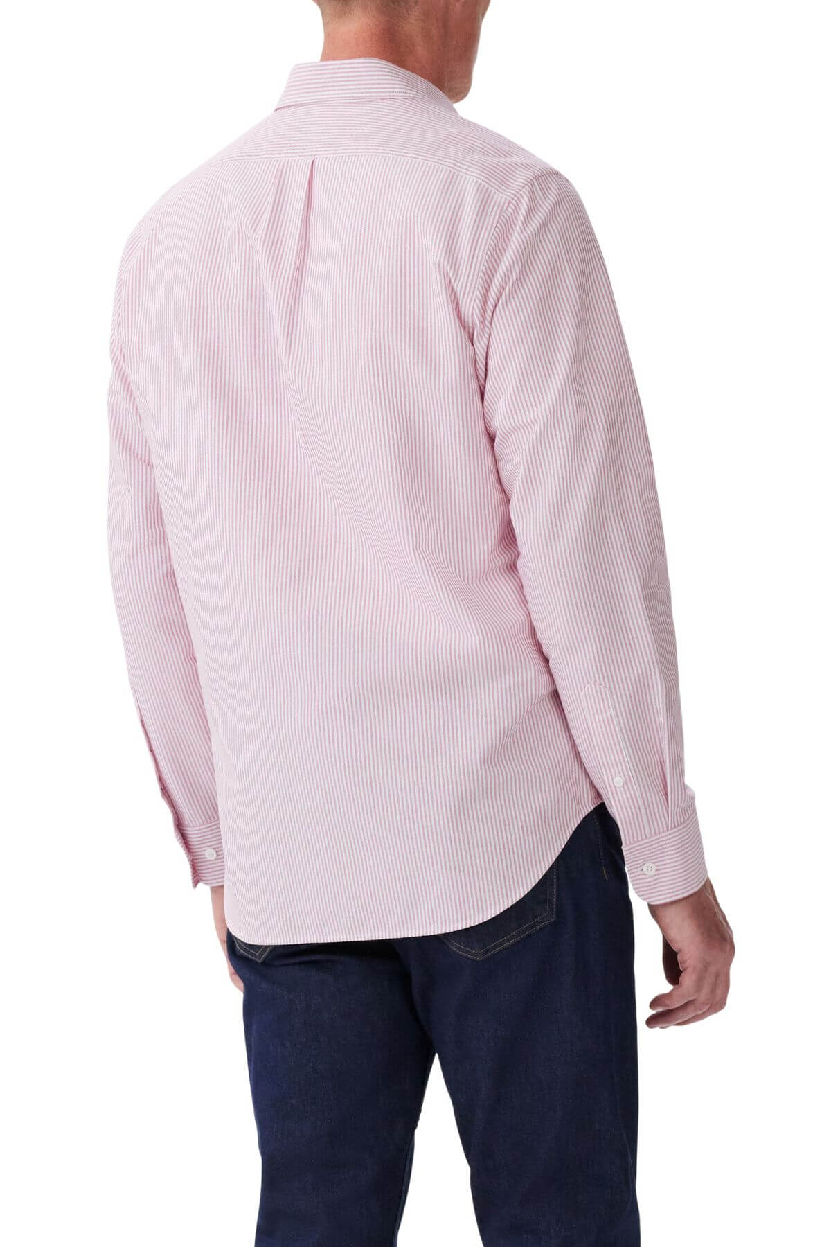 A man shown from the back against a white background wears an RM Williams Regular Shirt in light pink and white stripes with long sleeves, paired with dark blue jeans.