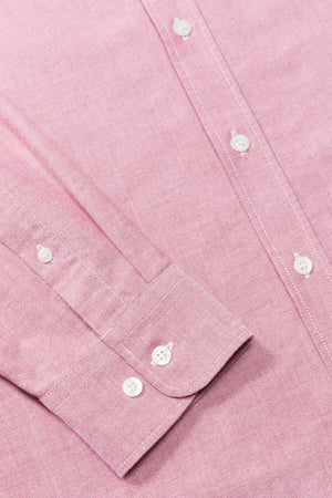 Close-up of the RM Williams Regular Shirt in pink organic cotton, featuring white buttons, visible stitching, and a neatly folded cuff.
