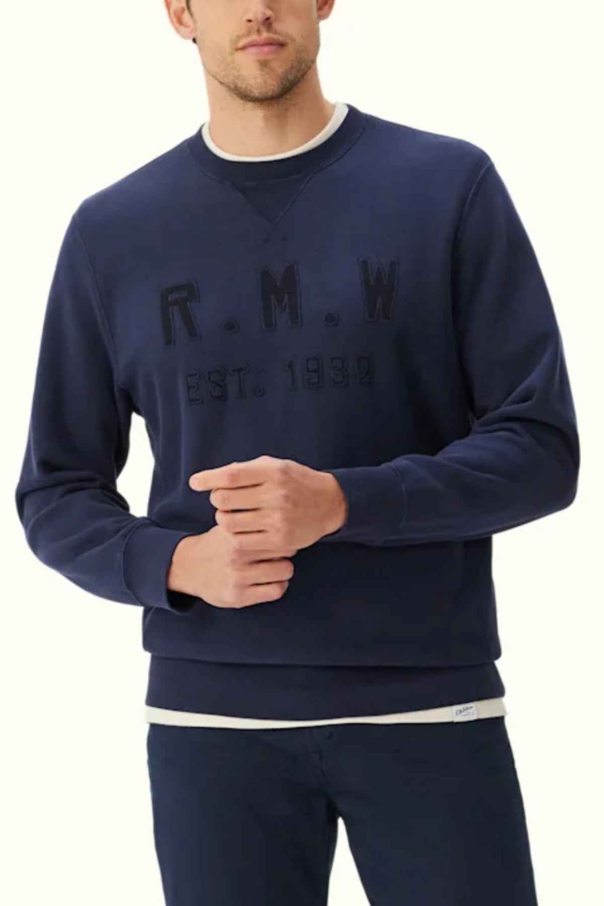 RM Williams Stencil Crewneck Sweatshirt in the colour Midnight. Model wearing jumper