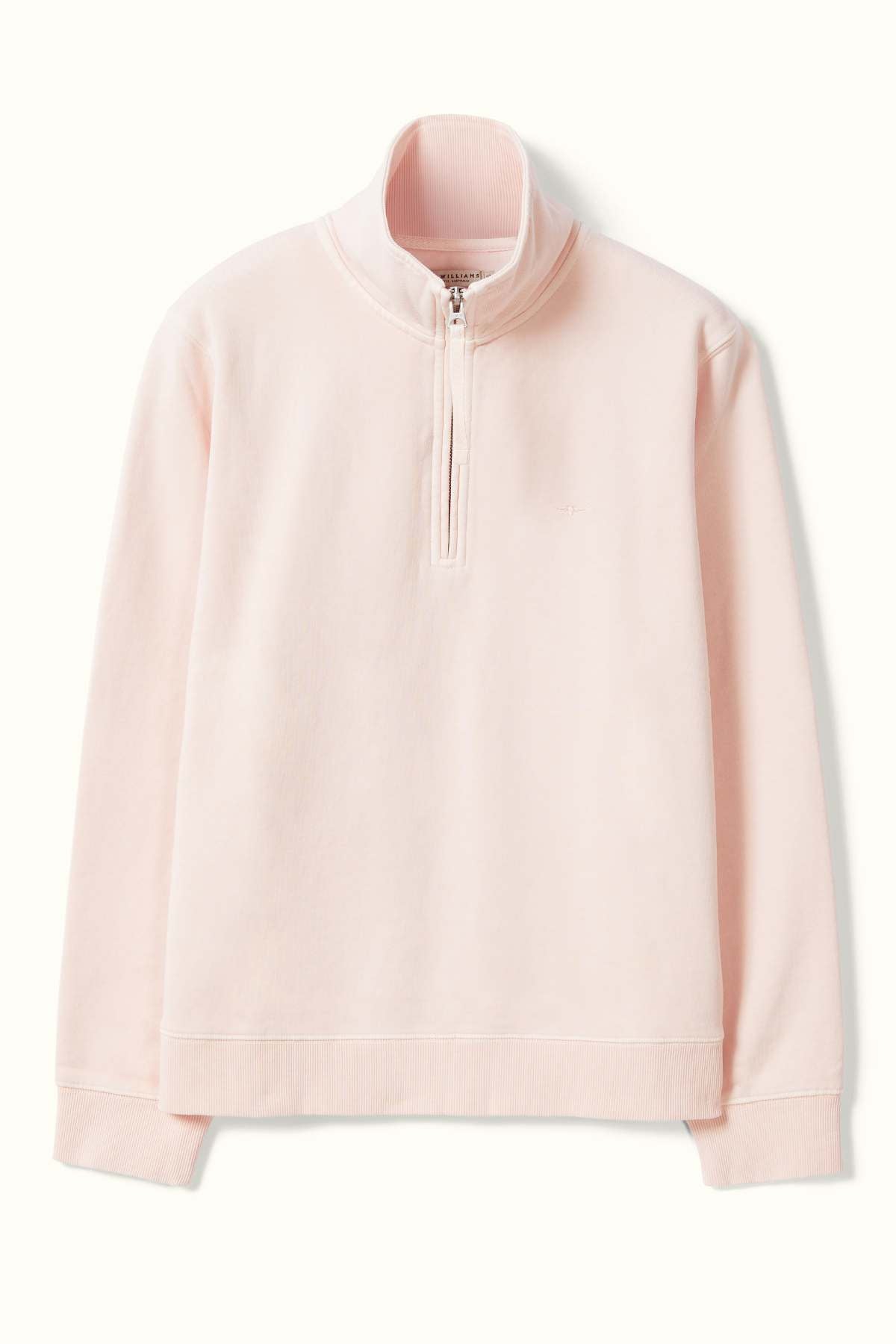The RM Williams Trickett 1/4 Zip Sweatshirt is a light pink, long-sleeve top featuring a quarter zip design and a relaxed fit with a high collar. Made from soft, organic cotton fabric, its ribbed cuffs add to the overall comfort, making it perfect for casual wear. The sweatshirt boasts a clean look with no visible logos or designs.