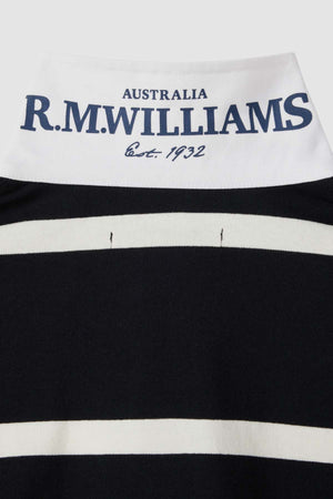 Close-up image of the back of an RM Williams Tweedale Rugby jersey, featuring black and white stripes. The white collar displays blue text that reads "AUSTRALIA R.M. WILLIAMS Est. 1932".