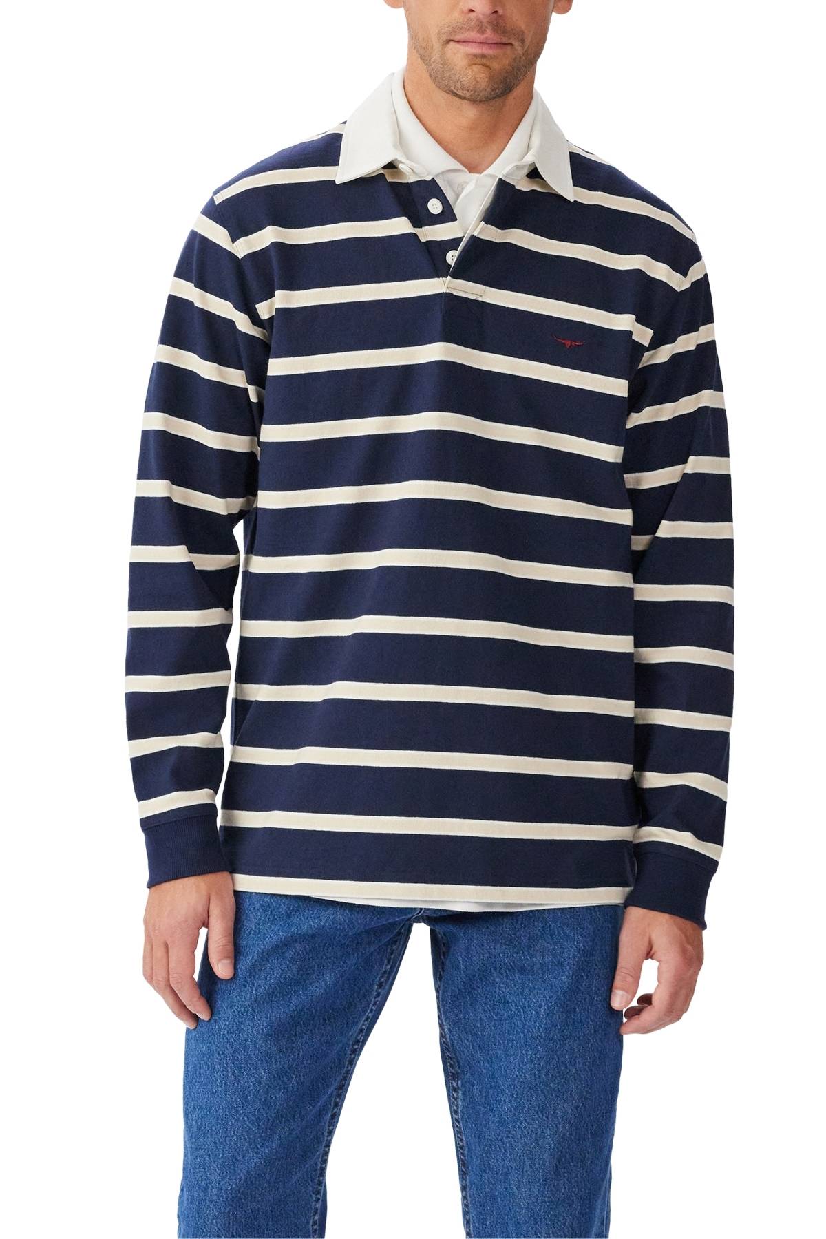 A man wearing the RM Williams Brunswick Rugby, a navy blue and white striped heavyweight brushed cotton shirt with a twill collar, paired with blue jeans.