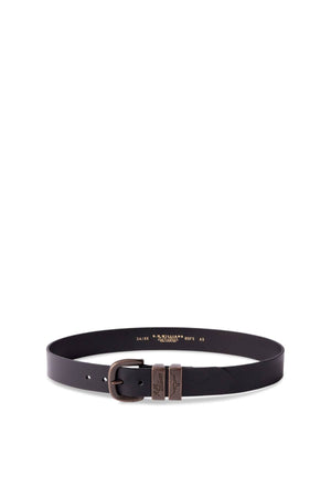 The RM Williams Drover Belt is a black pull-up leather belt with a bronze metal buckle, two decorative metal accents, and classic double keepers, displayed in a circular shape on a white background.