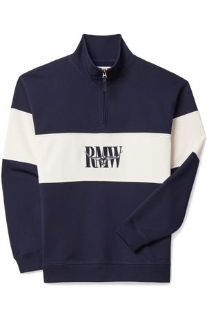 The RM Williams Heritage 1/4 Zip Sweatshirt is a navy blue and white organic cotton pullover, featuring a white chest stripe and the classic "RMW" heritage logo embroidered in black on the front center.