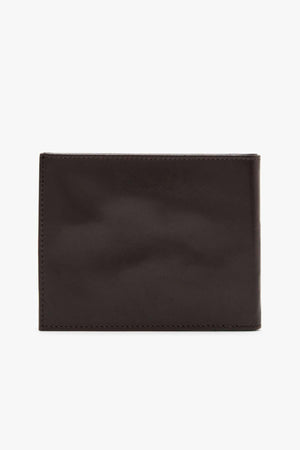 A closed RMW Singleton Wallet with Coin Pouch, made from calf leather in dark brown, showcases a sleek finish and minimal stitching, centrally displayed against a simple white backdrop. Mindfully designed with RFID protection, it keeps your cards safe and secure.