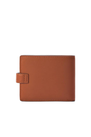 The RM Williams Wallet with Pocket and Tab, crafted from full grain leather and featuring a snap button strap, is displayed closed against a plain white background.