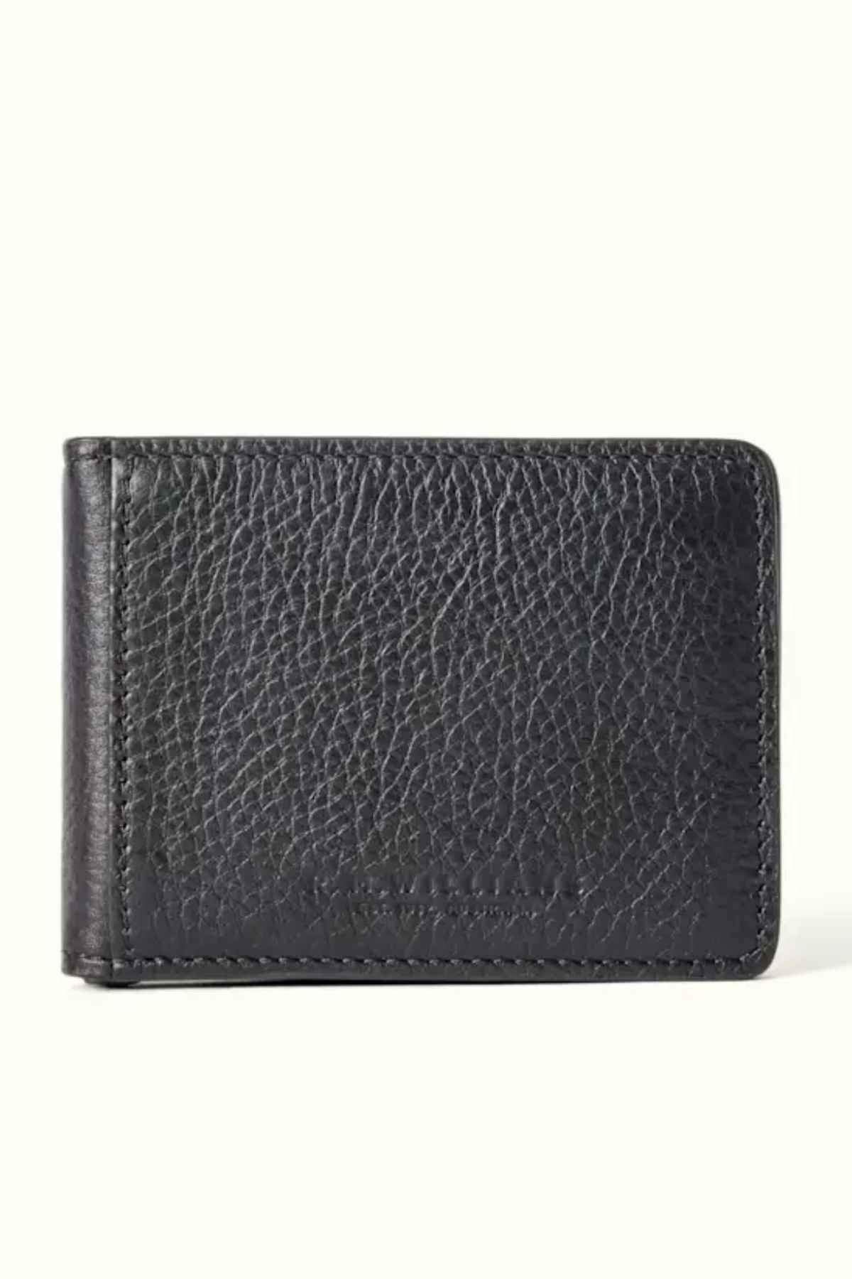 The RM Williams Farrier Bi Fold Wallet is crafted from premium smooth leather, featuring a black textured surface with visible stitching around the edges. It is closed and positioned against a plain, light background.