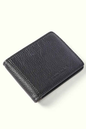 The RM Williams Farrier Bi Fold Wallet, crafted from black leather with a textured surface and featuring multiple card slots, is depicted folded and closed against a neutral light background.
