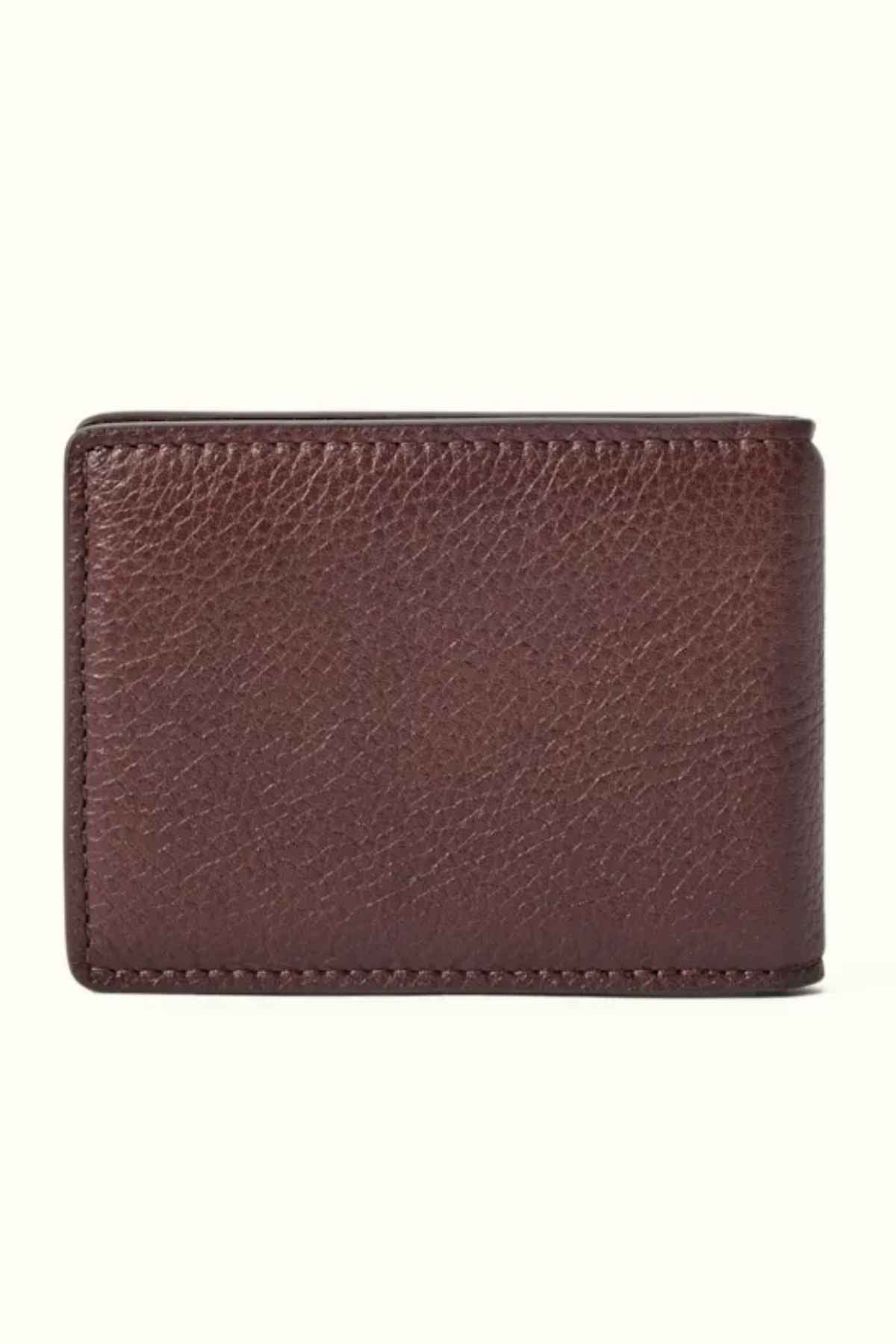 The RM Williams Farrier Bi Fold Wallet, crafted from premium brown leather, is shown closed with its textured surface highlighted against a light background.